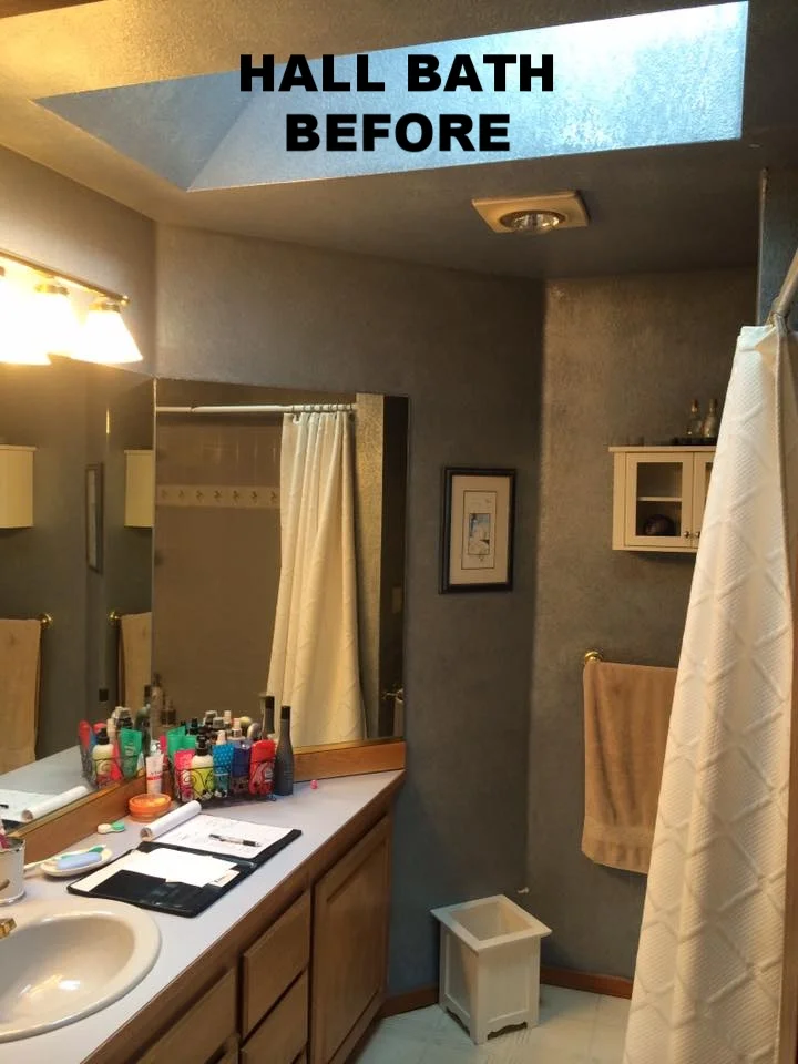The hall bath was the next on our list and with its unique shape and general feeling of heaviness, the goal was to lighten it up!