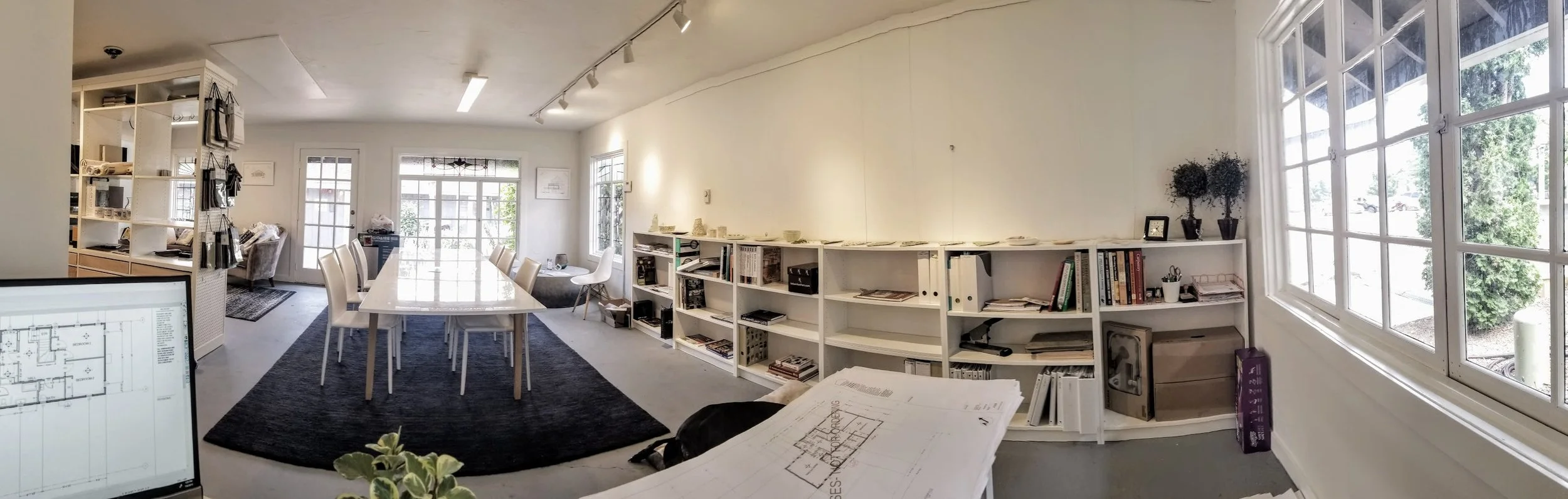 My first day working in the new office was so peaceful and such a moment of pride, I had to snap a quick shot. The empty wall to the right is designated for artists to display and sell their work from the space.