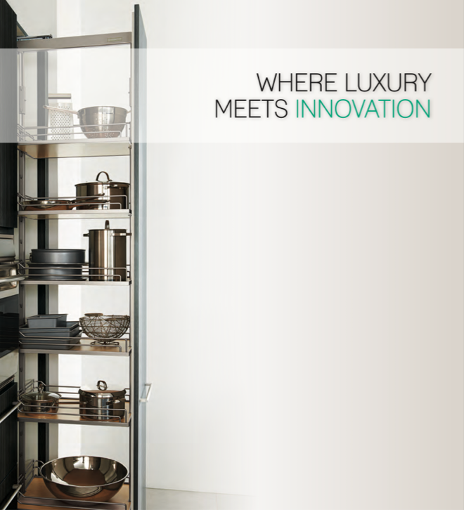Open kitchen pantry with stainless steel pots and pans, wire baskets, and kitchenware, alongside the phrase 'Where Luxury Meets Innovation' on a white wall.