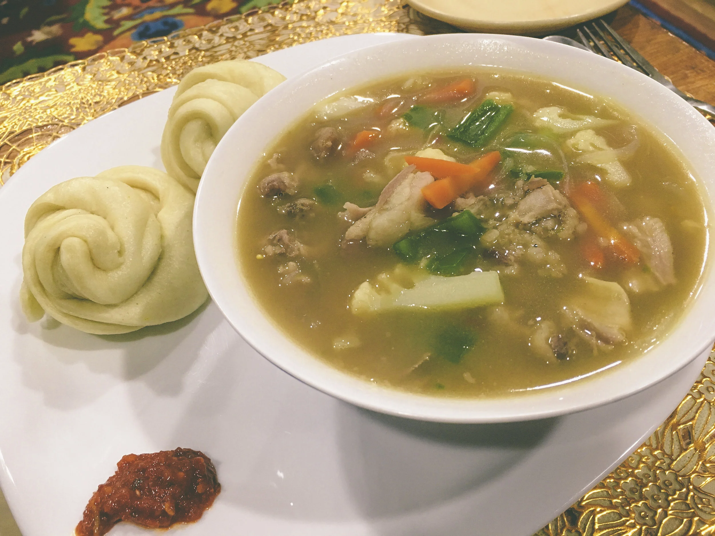 Lamb soup, traditional home cooked bread, and chilli