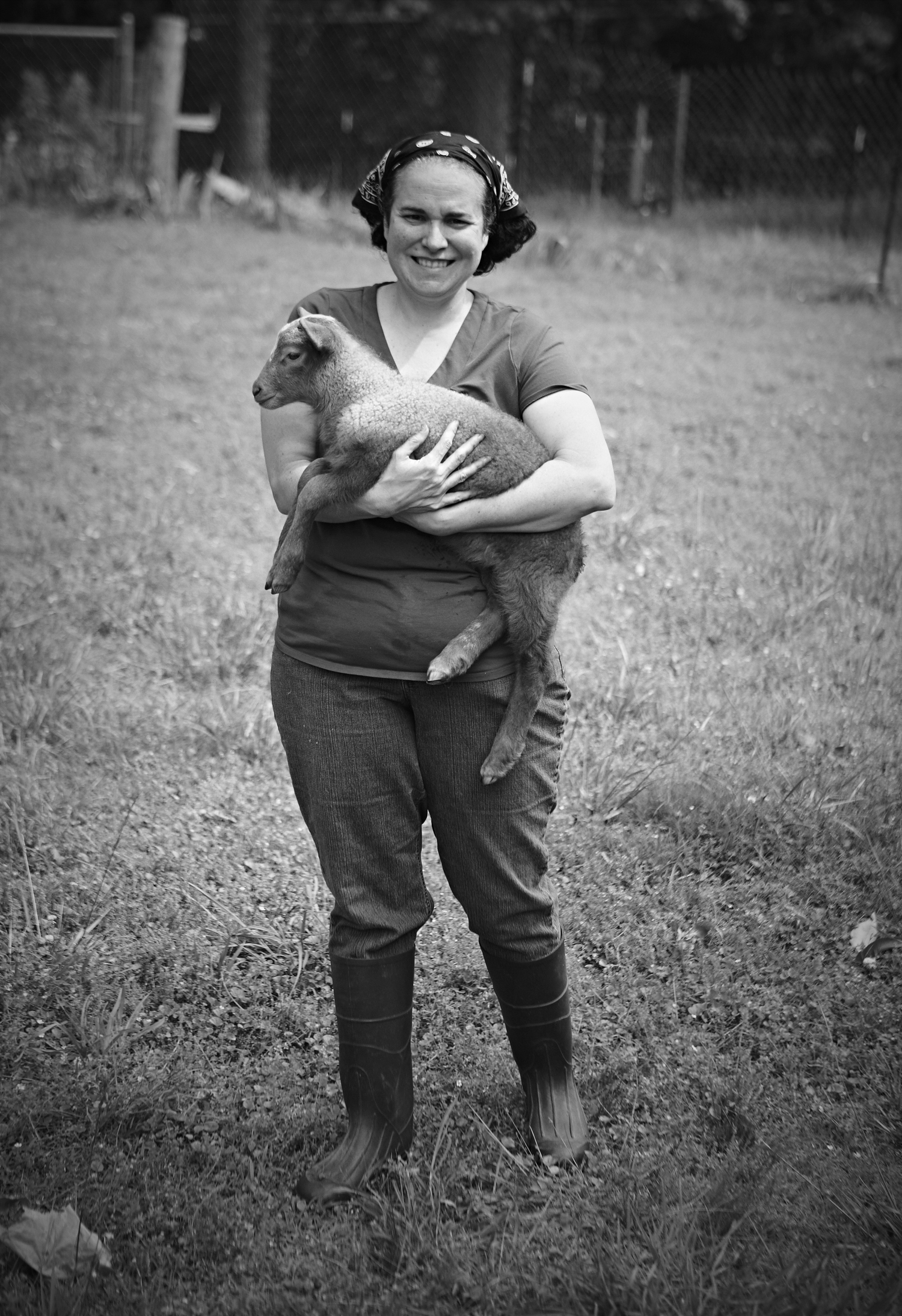  Ana holding Latte the lamb a t Dayspring Dairy . 