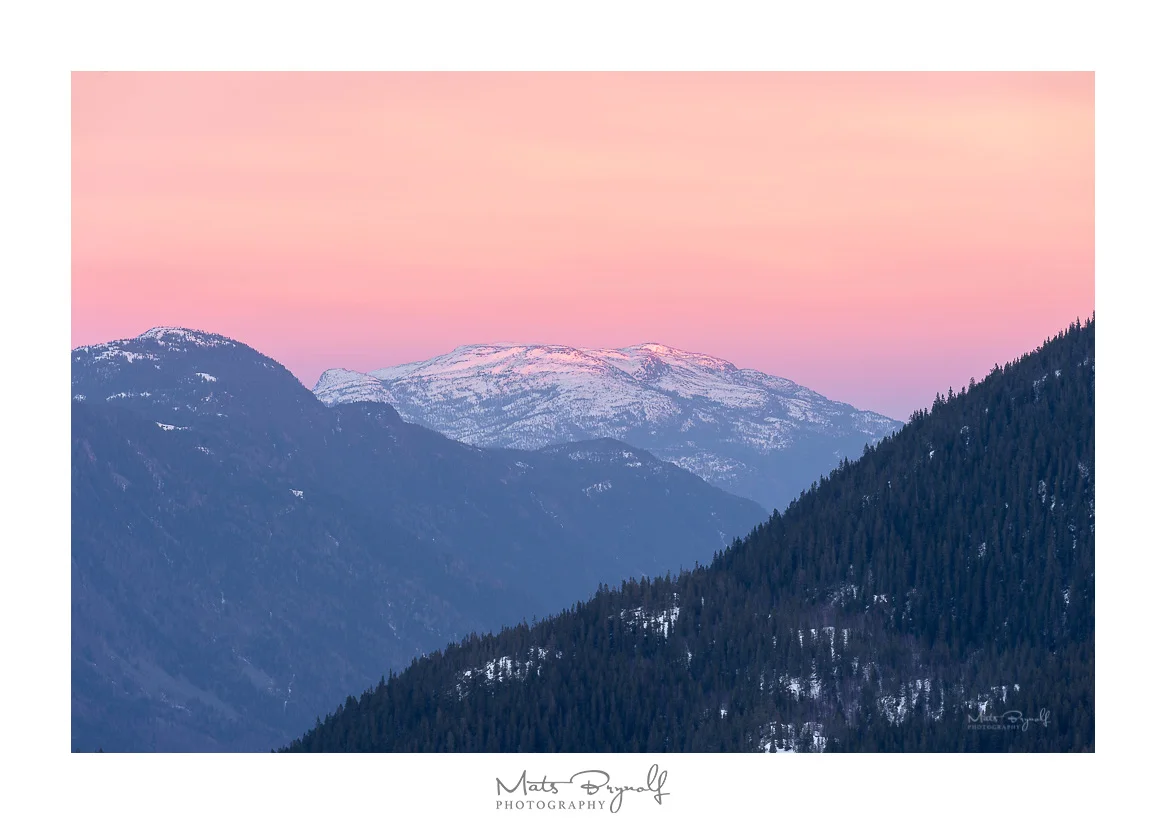 View over Dalen, Norway mountain range at sunset.