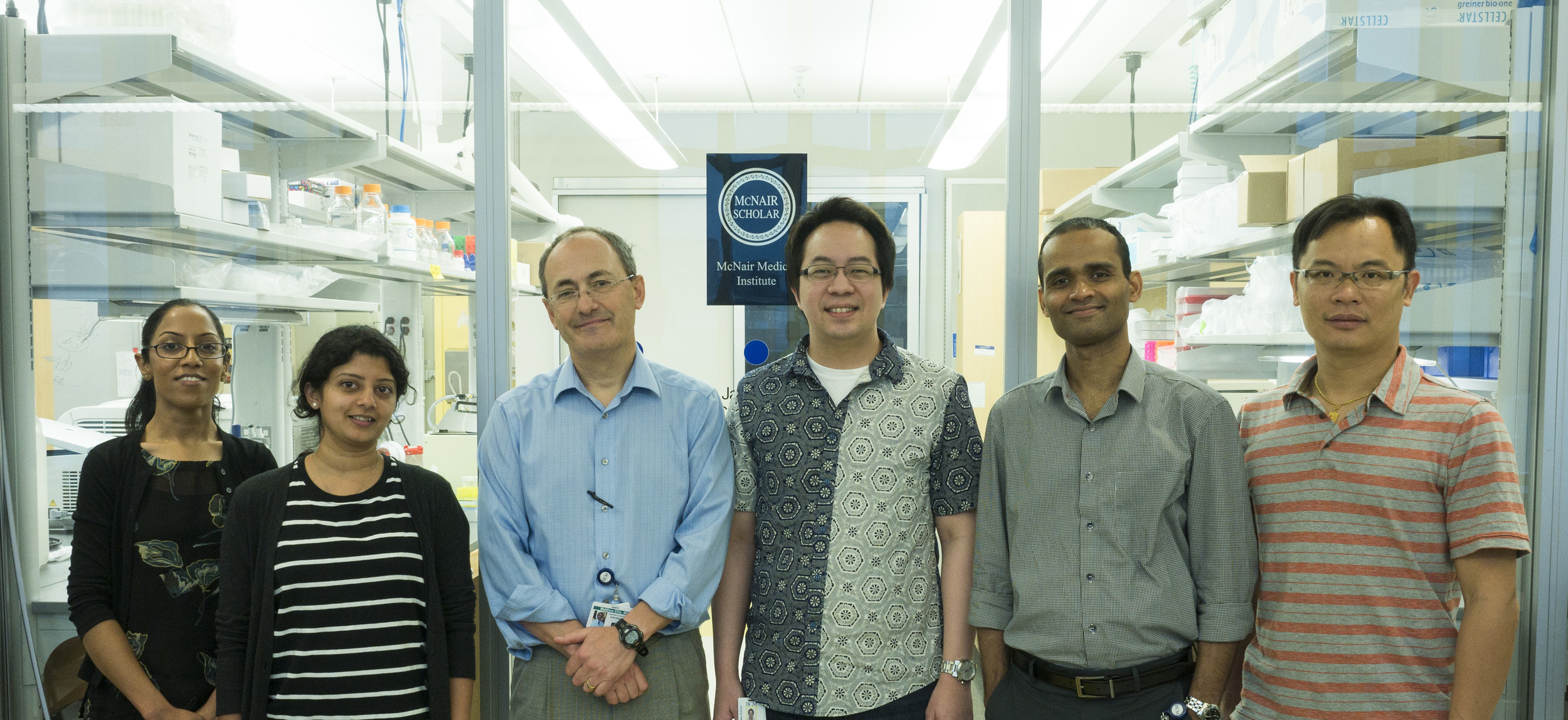 Dr. Ellis and the research team at the Baylor College of Medicine.