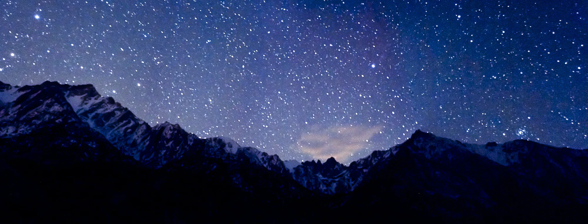 A astro panoramic landscape image of Mt Whitney at the Sierra Nevadas.
