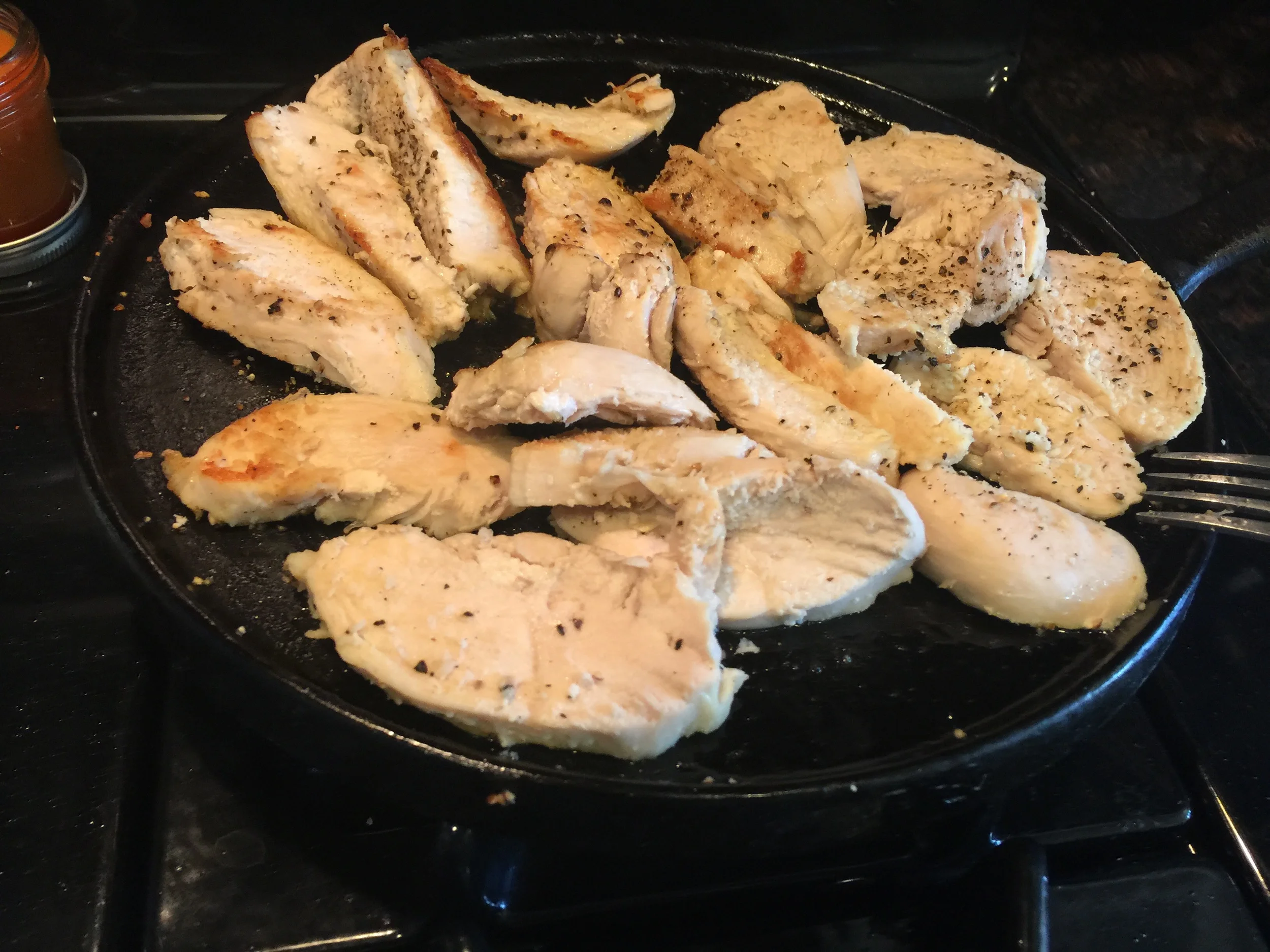 Once the chicken is done boiling toss it on the grill for about 5 mins. I sprinkled black pepper on it and let it sit for a few. 