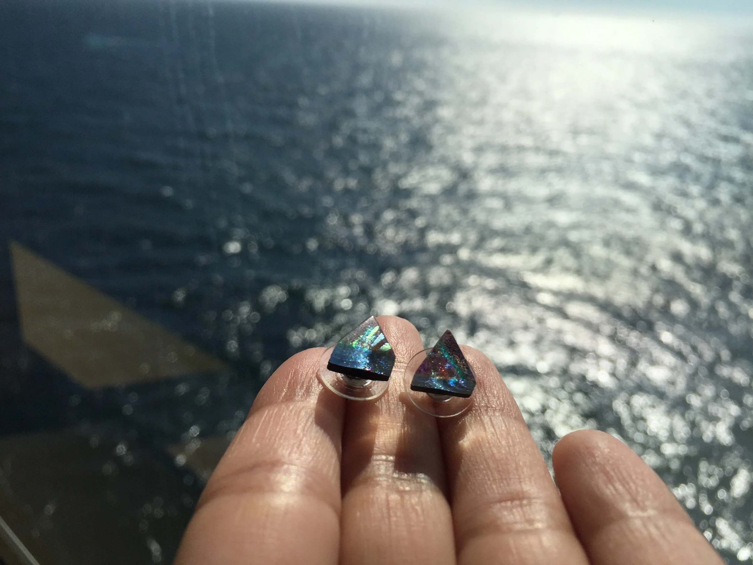 Be sure to check out your local shops for a piece of jewelry to add color. These were purchased in Sitka, Alaska. They are handcrafted, made from glass & inspired by the northern lights.