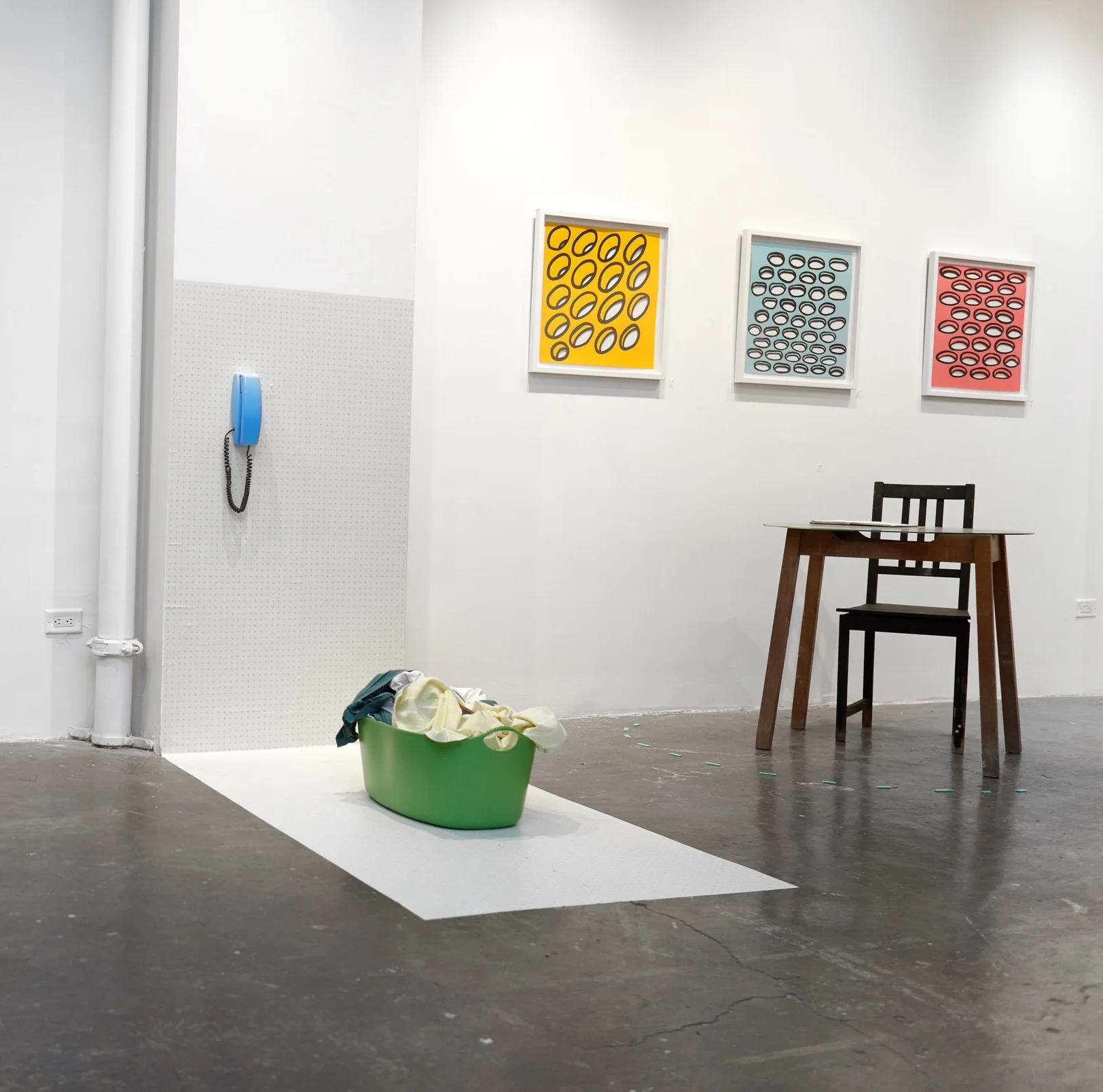 Partial gallery view of Om, I'm Home including artworks by (left and right floor) collaboration between Kat Geng & Jon Levy-Warren, (center wall) Kyle Knobel. Photo by Cassandra Niki. 