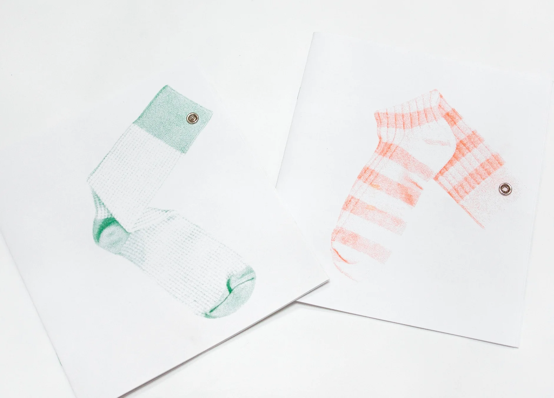 Om, I'm Home. (20 page) zine, risograph printed by Colpa Press, cover design by Kat Geng chronicling the artworks of all participating artists with accompanying poem by Katrina Goldsaito. photo by Derek Macario.