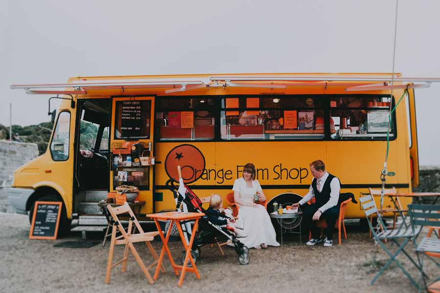 Bride and groom drinking coffee