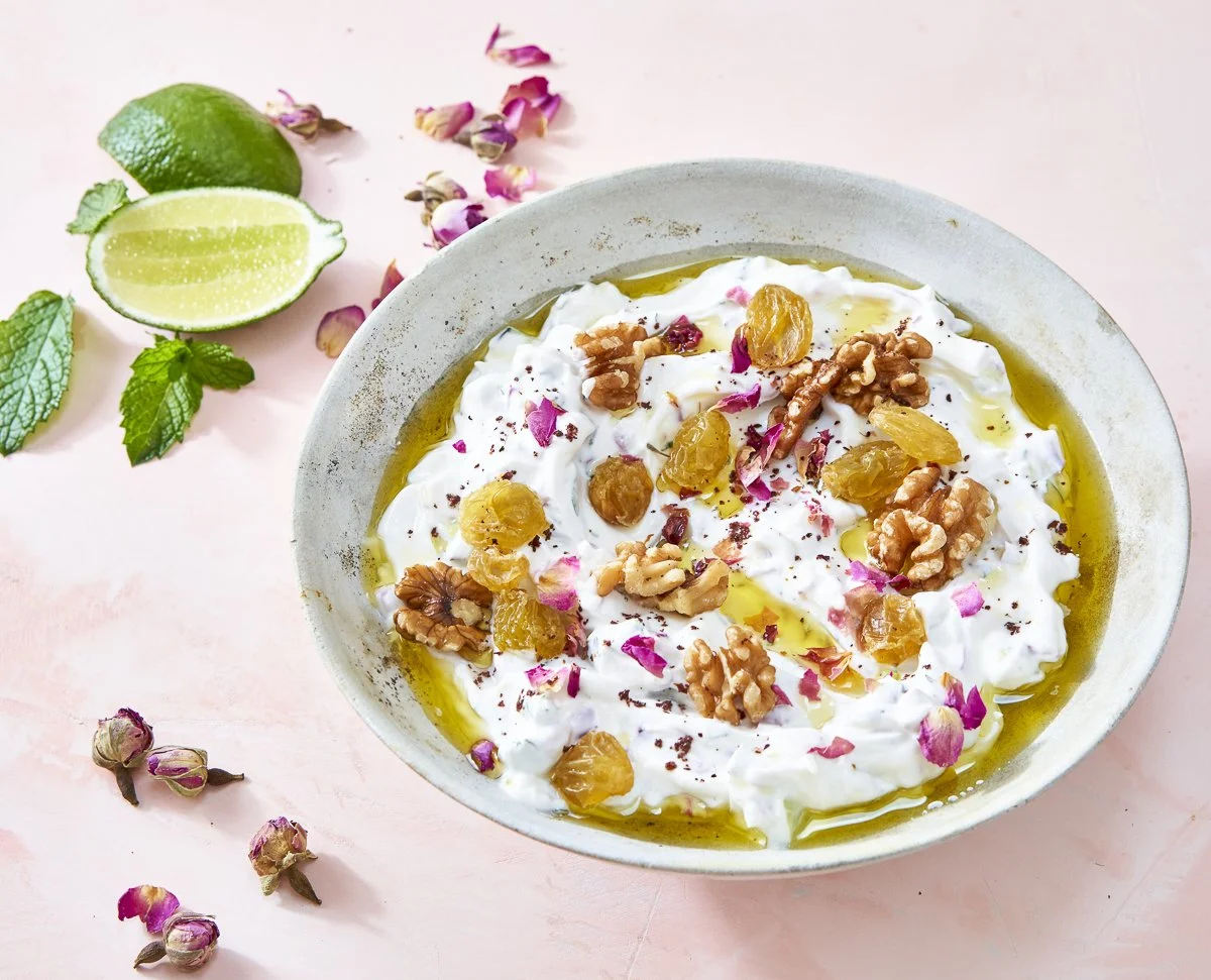 Mast o Khiar Persian yogurt cucumber dip topped with Villa Jerada dried rose buds and olive oil