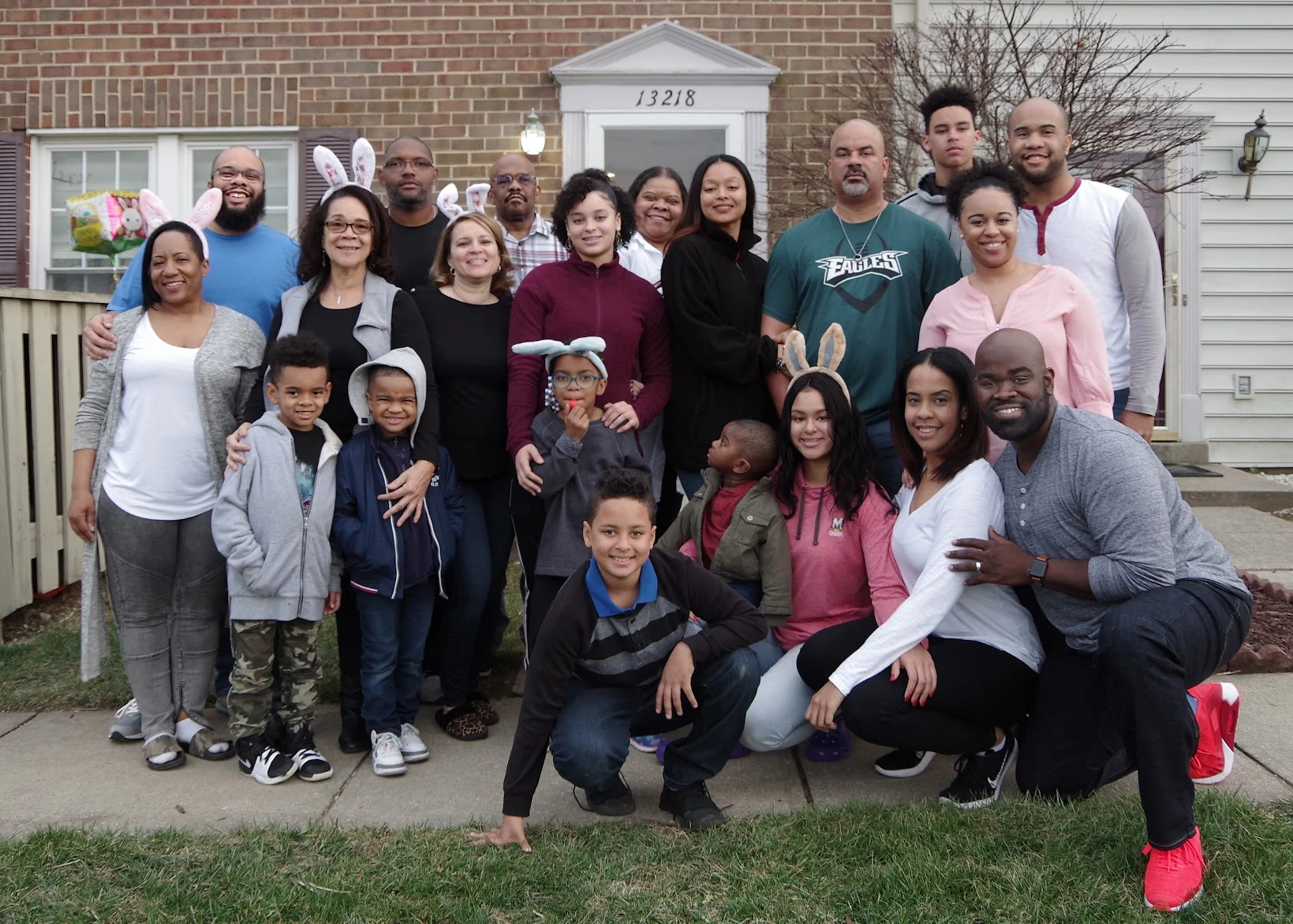 My mom pictured with her husband, five kids, five daughters and sons-in-law, and eight grandchildren at Easter, 2018.