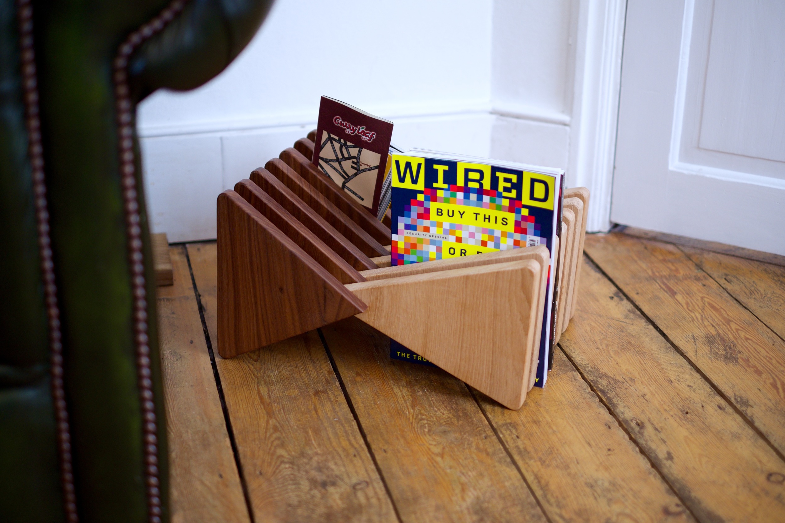 The Vinci Stool in magazine rack mode