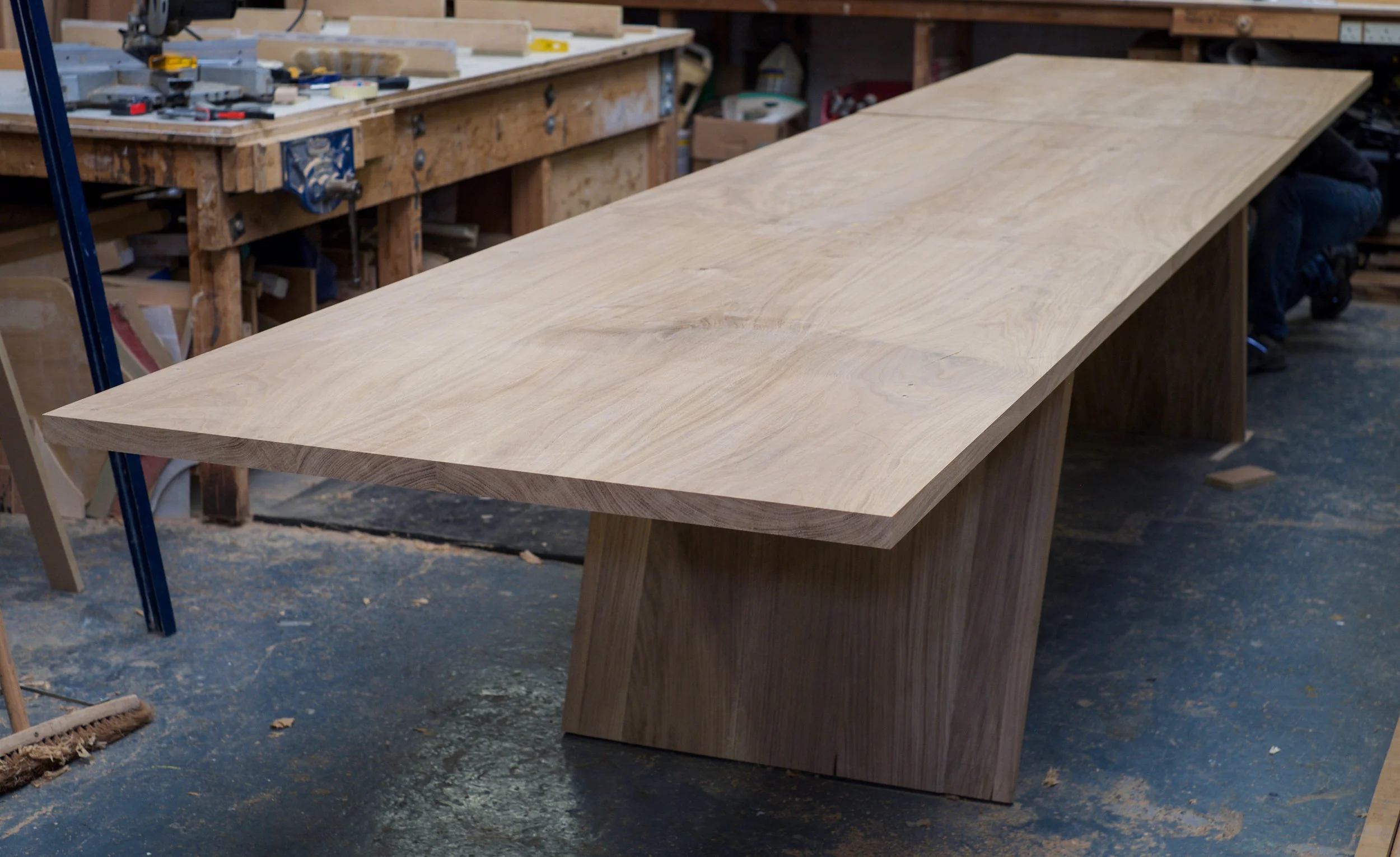 The Blade Table fully extended (as the table top is not attached to the frame, we can see Richard supporting the furthermost table top section. 