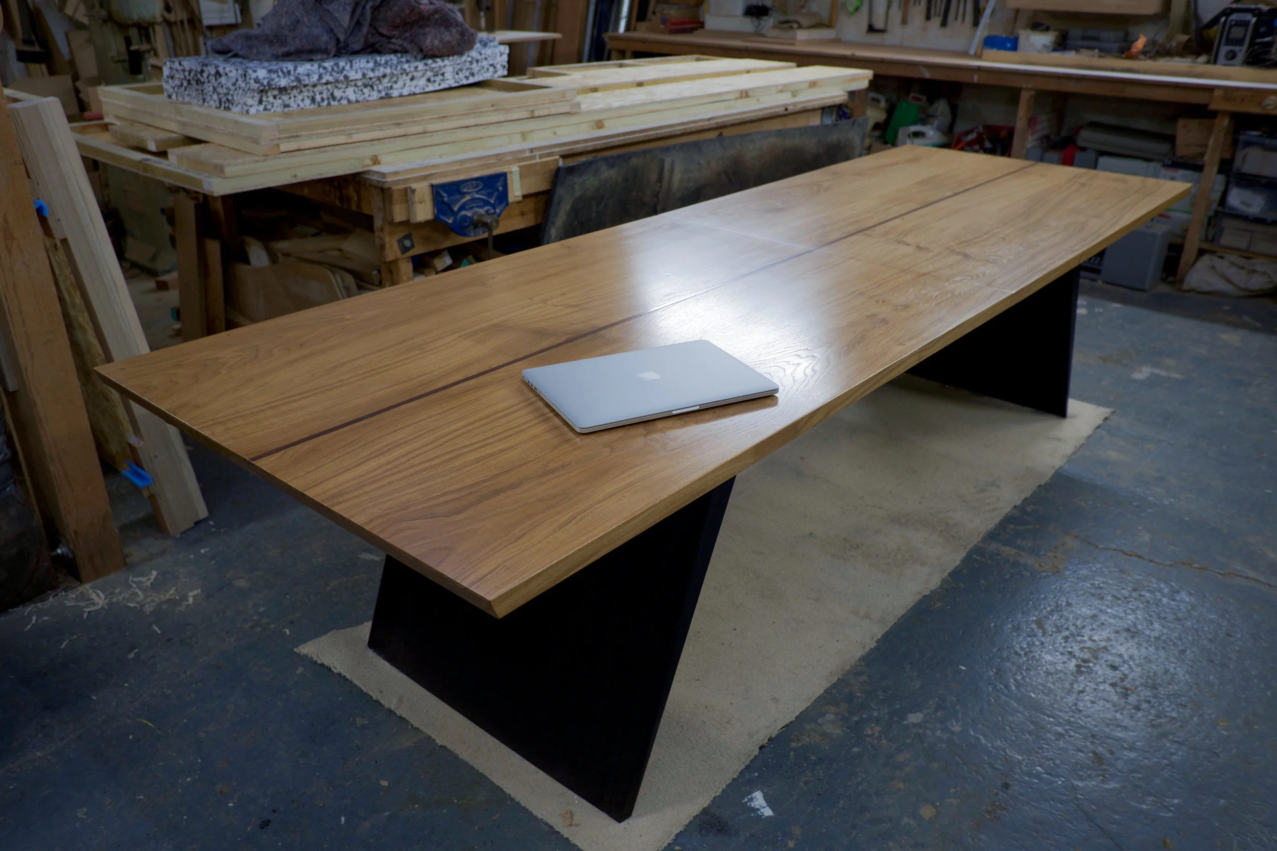 The Blade Dining Table - with the extending section folded away