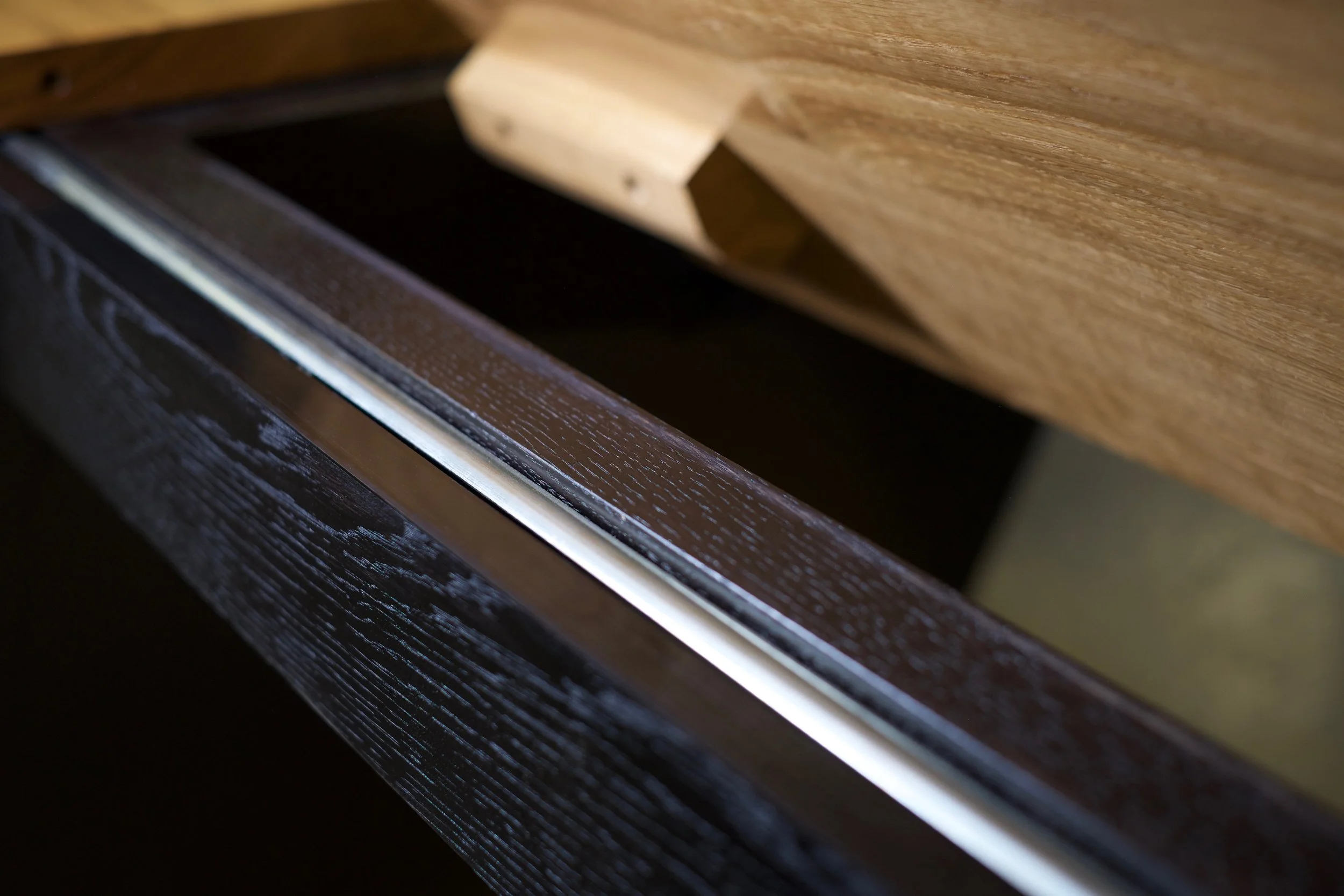 Detailed shot of the ebonised oak frame 