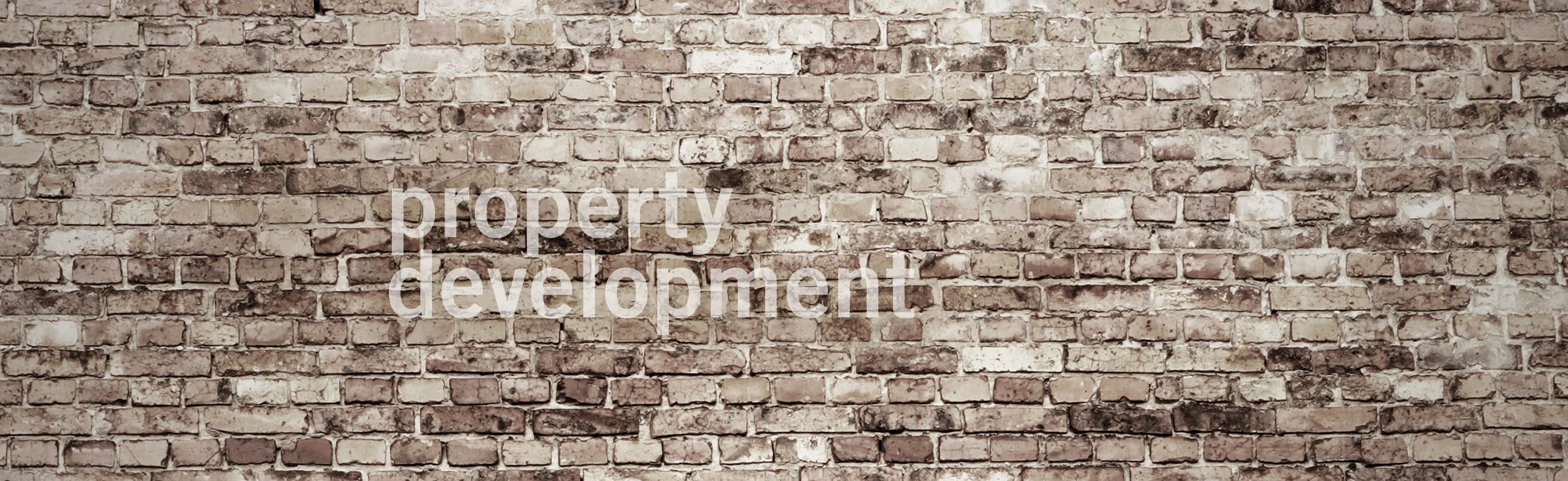 SMARTER LIVING_BRICK WALL_PROPERTY DEVELOPMENT.jpg