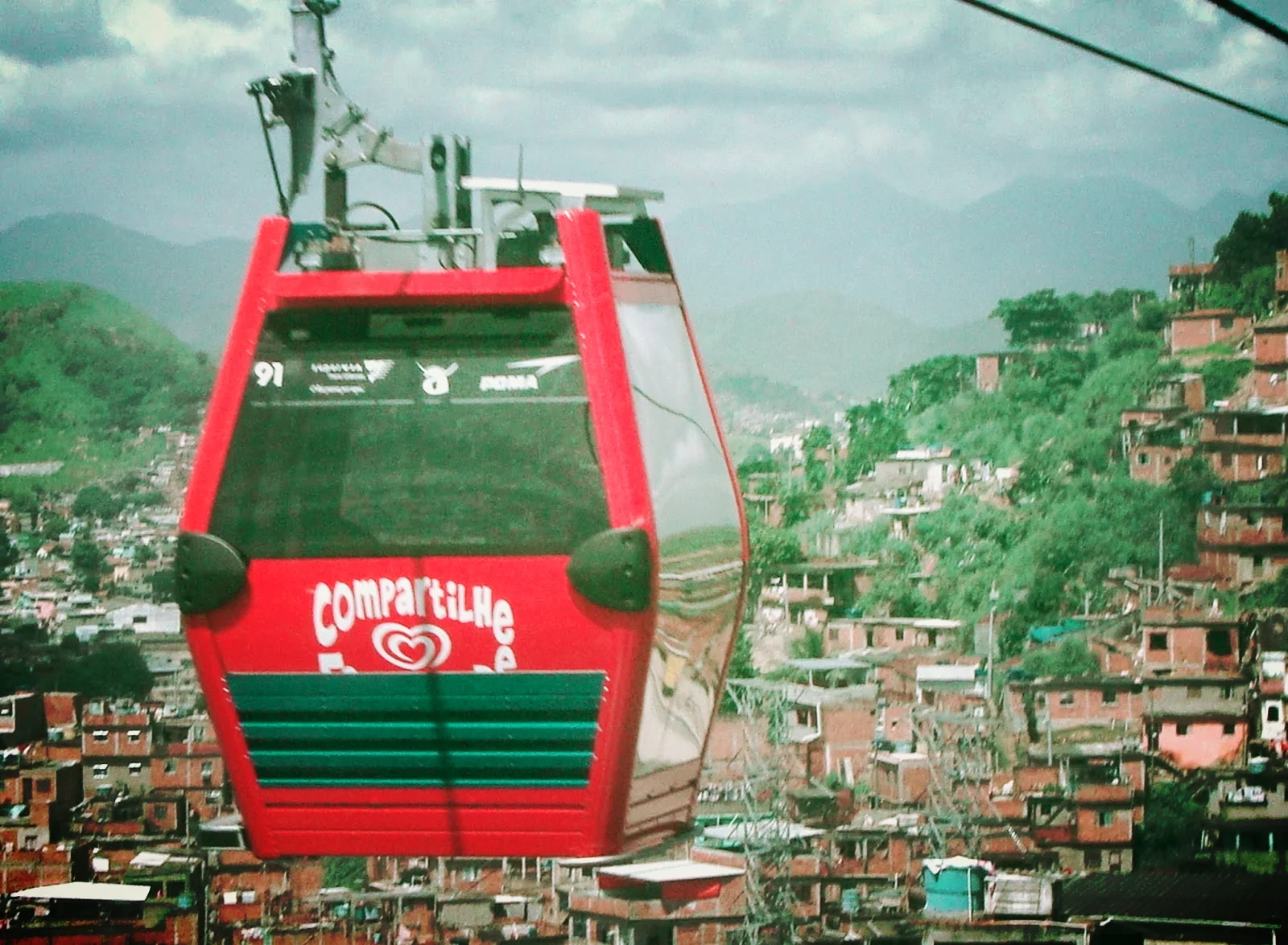 TELEFERICO: A transportation system, typically one traveling up and down a mountain, in which [hexagon shaped] cabins are suspended to connect two points.