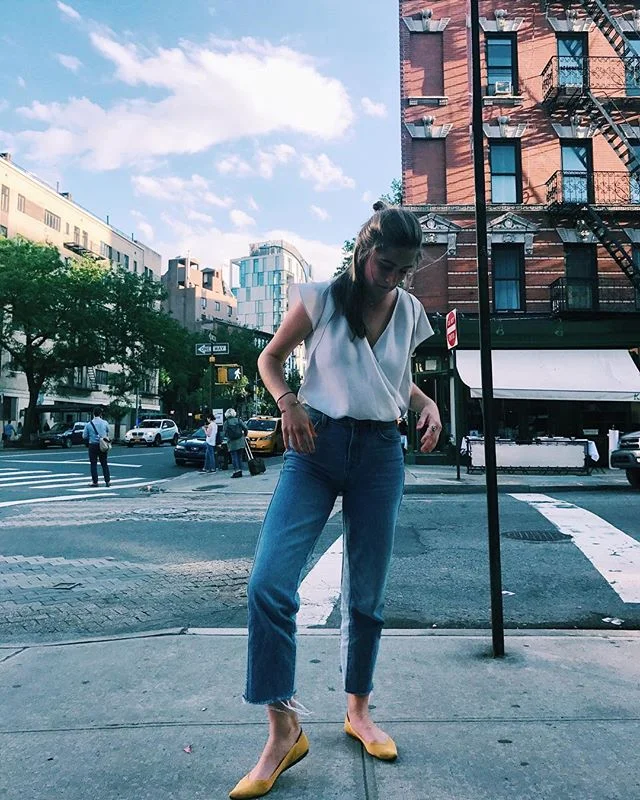 I apologize for being MIA these past few days (and for the weird dinosaur arms that I've got going on in this photo) but I have been busy with something very exciting! If you can't tell by my new-wave-business-casual attire and sensible footwear, I a