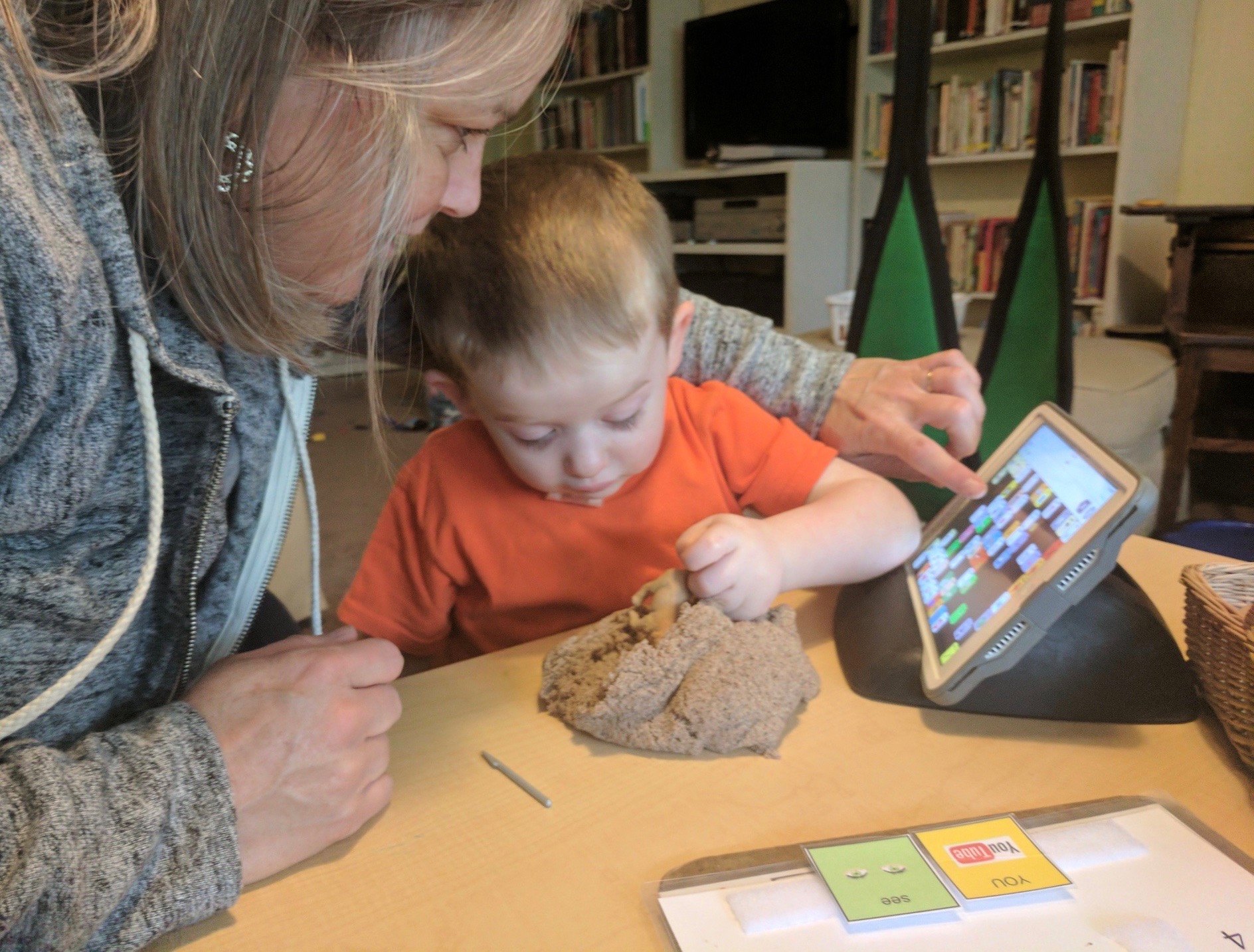 Nathaniel and I enjoying a Buried Treasure activity from the Tell Me program. Photo Credit: Josiah Rankin