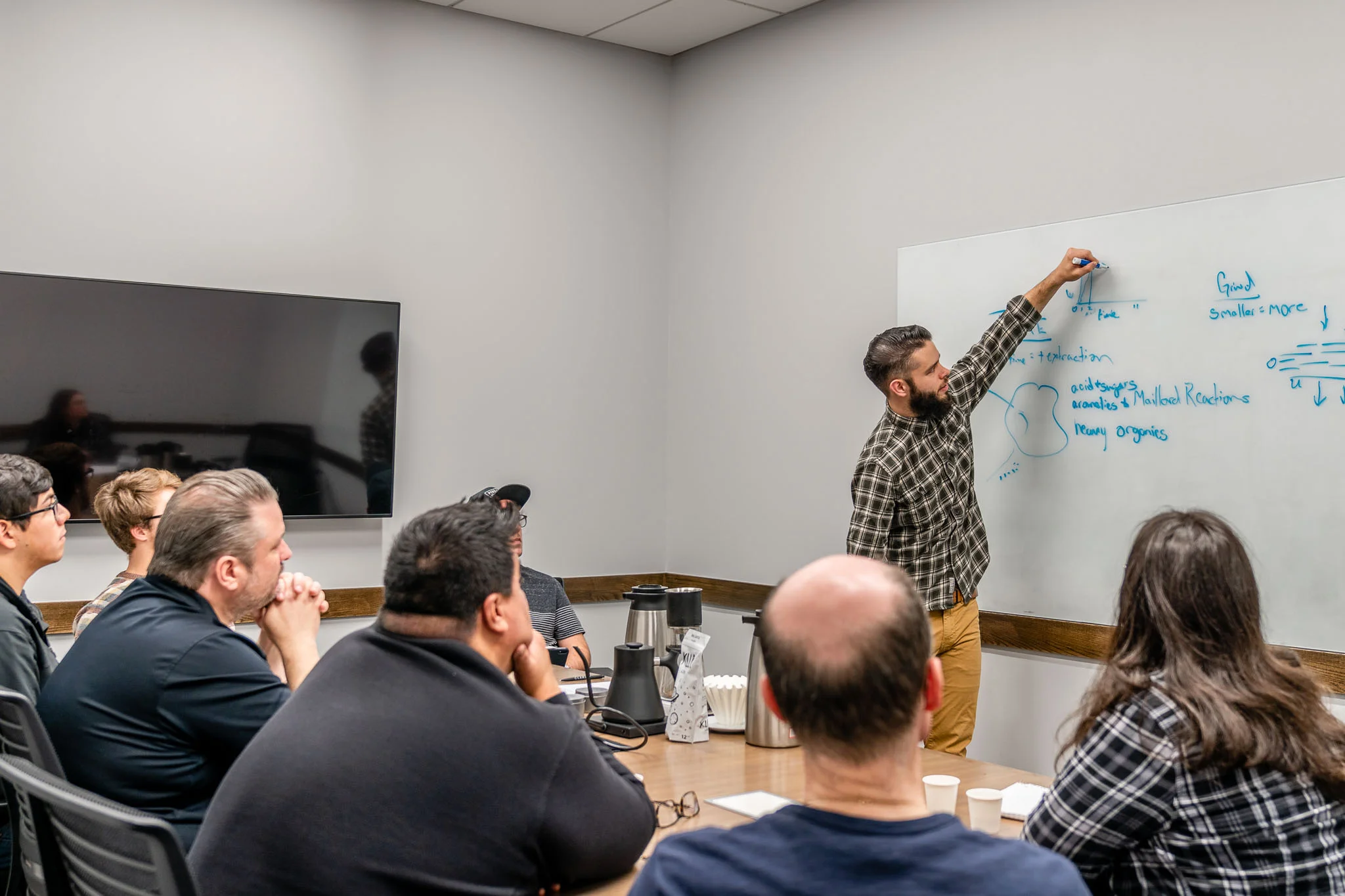 Caleb Teaching Coffee Class.jpg