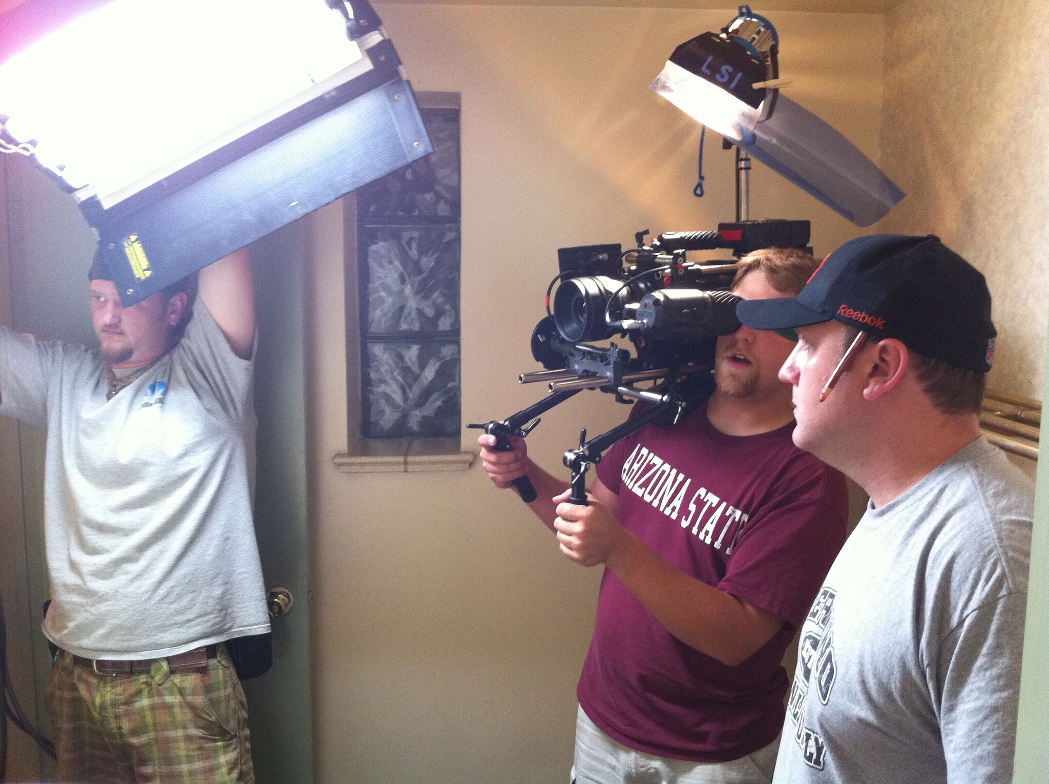 KC Weatherman, Jon Stevenson and John Schmidt (Camera Assist) shoot the mirror.