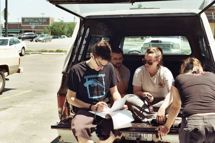 Jimmy, Annie, Brandon Fryman (Production Designer) and Tara are figuring out how to finish the shoot with a raging lunatic next door and used condoms being left at our set. But we still managed to finish a day ahead of schedule