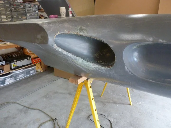 Now, they are re-installed and fiber-glassed into place from the back side.