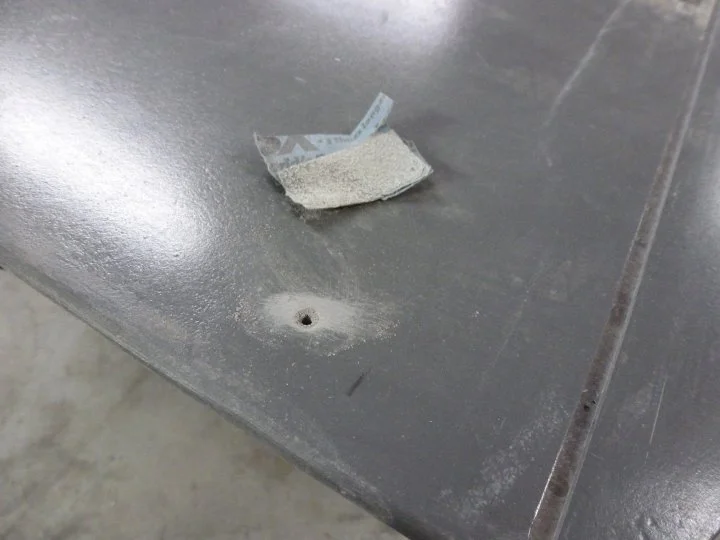 Next I hit the edges with a piece of sandpaper so the filler can taper out and not leave a hard edge.