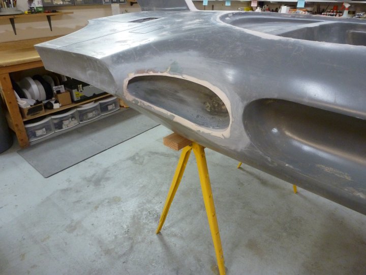 I sanded the first coat of bondo that was applied to the rear air scoops. They will need another pass or two of bondo.