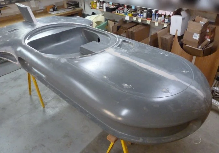 It doesn't look like much progress, but it's tedious. The first layer of bondo is on all the joints and holes.