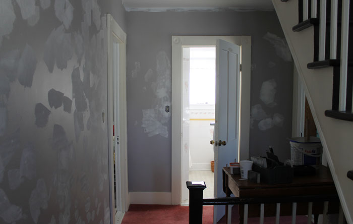 Looking towards the bathroom, attic stairs on the right with chocolate steps and risers all painted now and so much better.