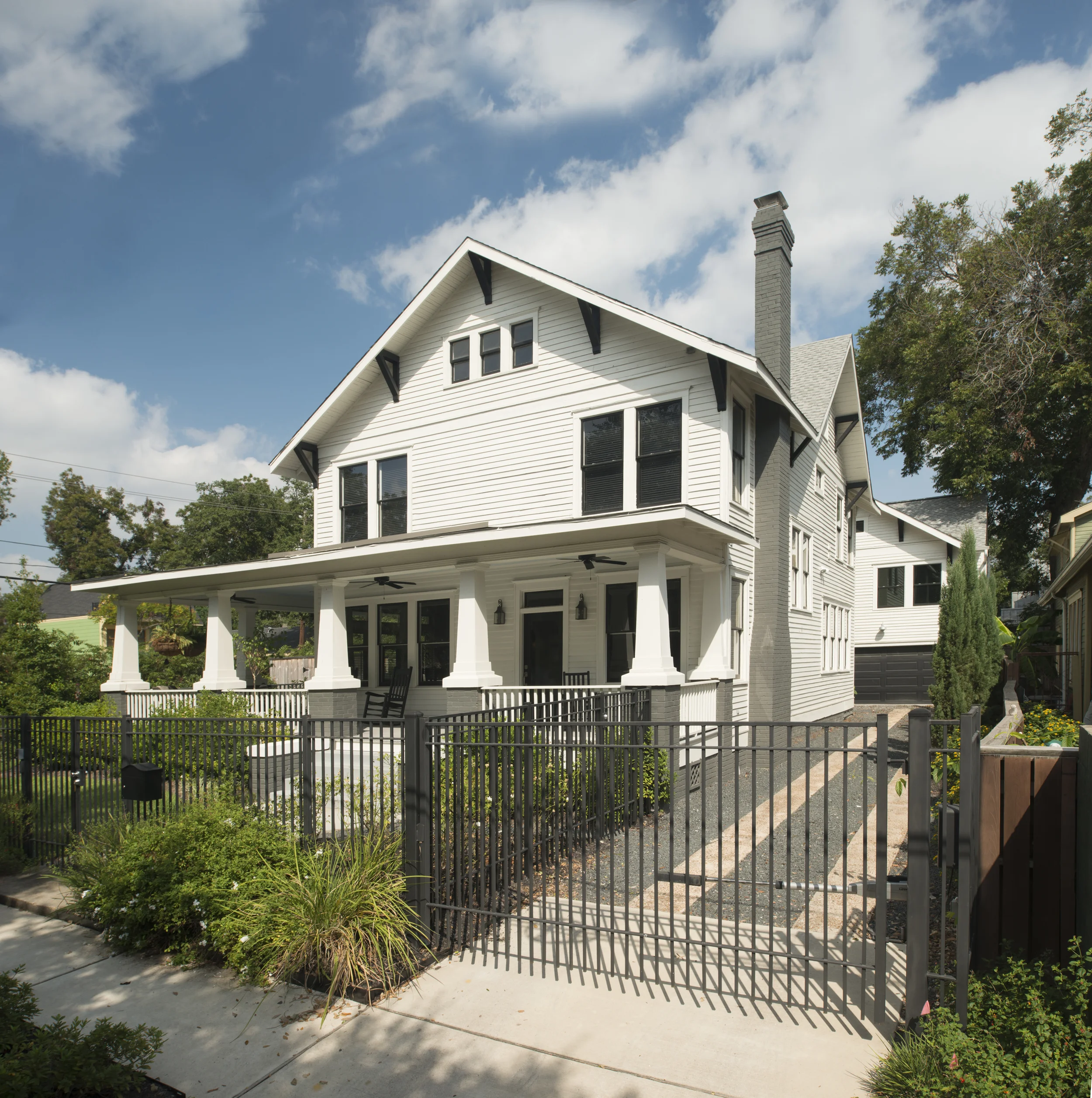101 Parkview: Early-century Four Square with new addition, converted attic and preserved interior design features.