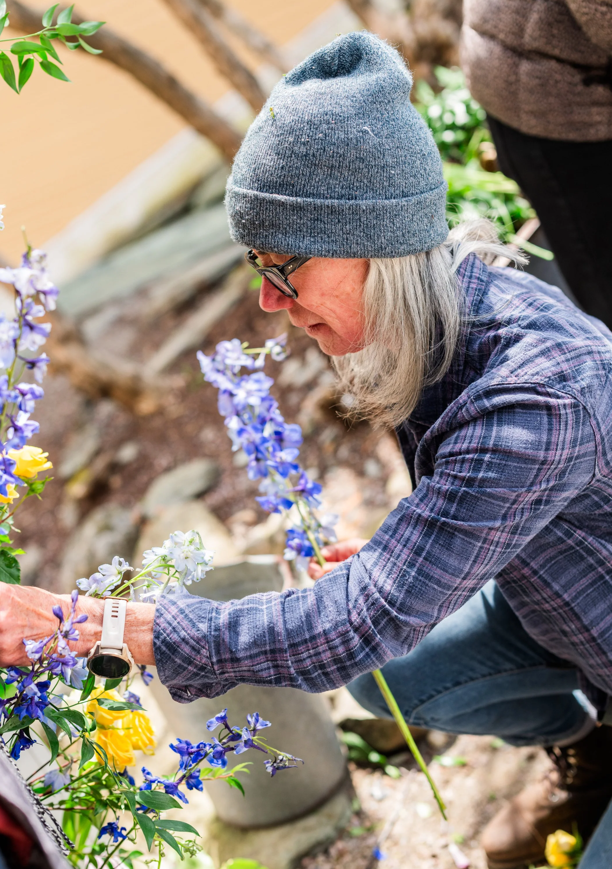 MaryAnn, owner and designer, working on an installation