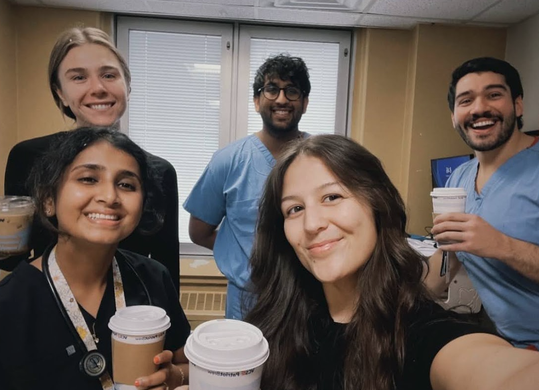 group of medical residents drinking coffee at the hospital
