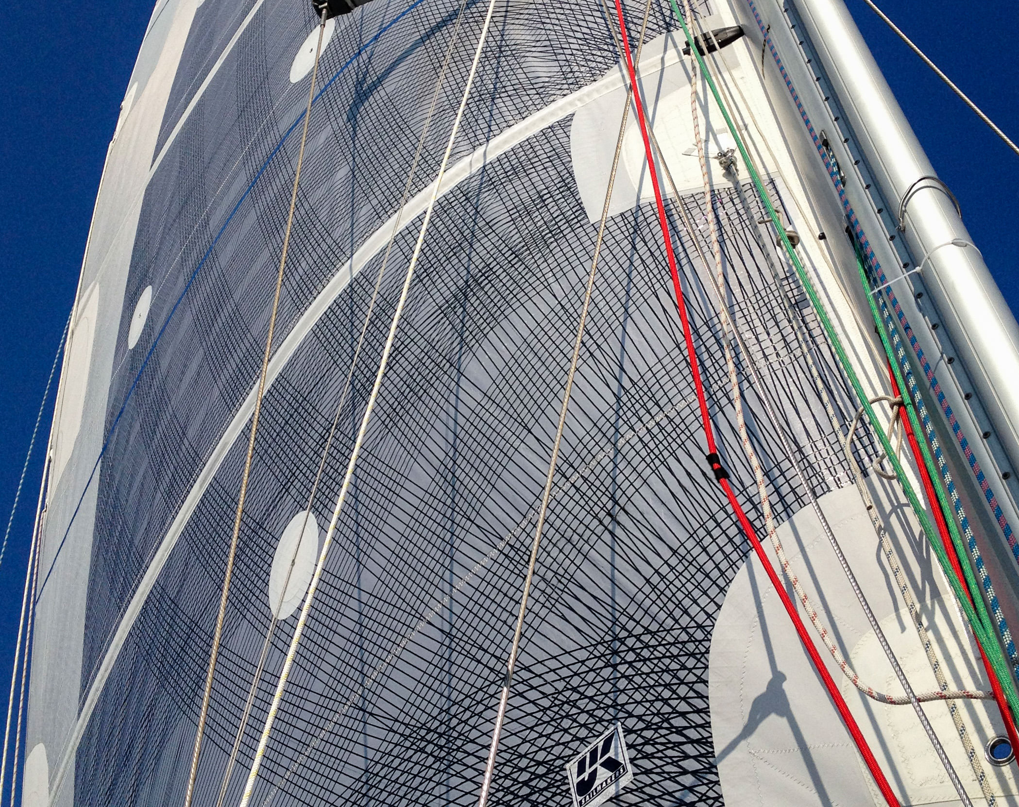 An example of the nearly full coverage of carbon fibers on a mainsail.