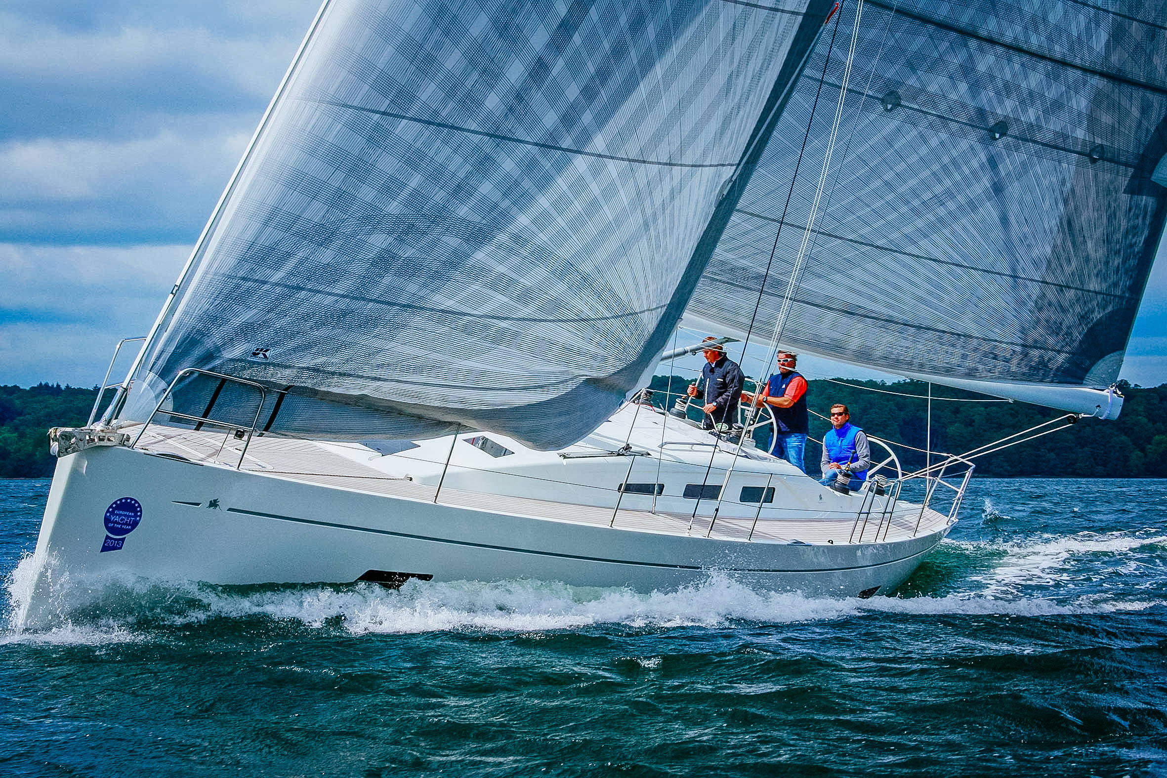 An Italia 13.98 with X-Drive taffeta carbon cruising sails. Click to enlarge.