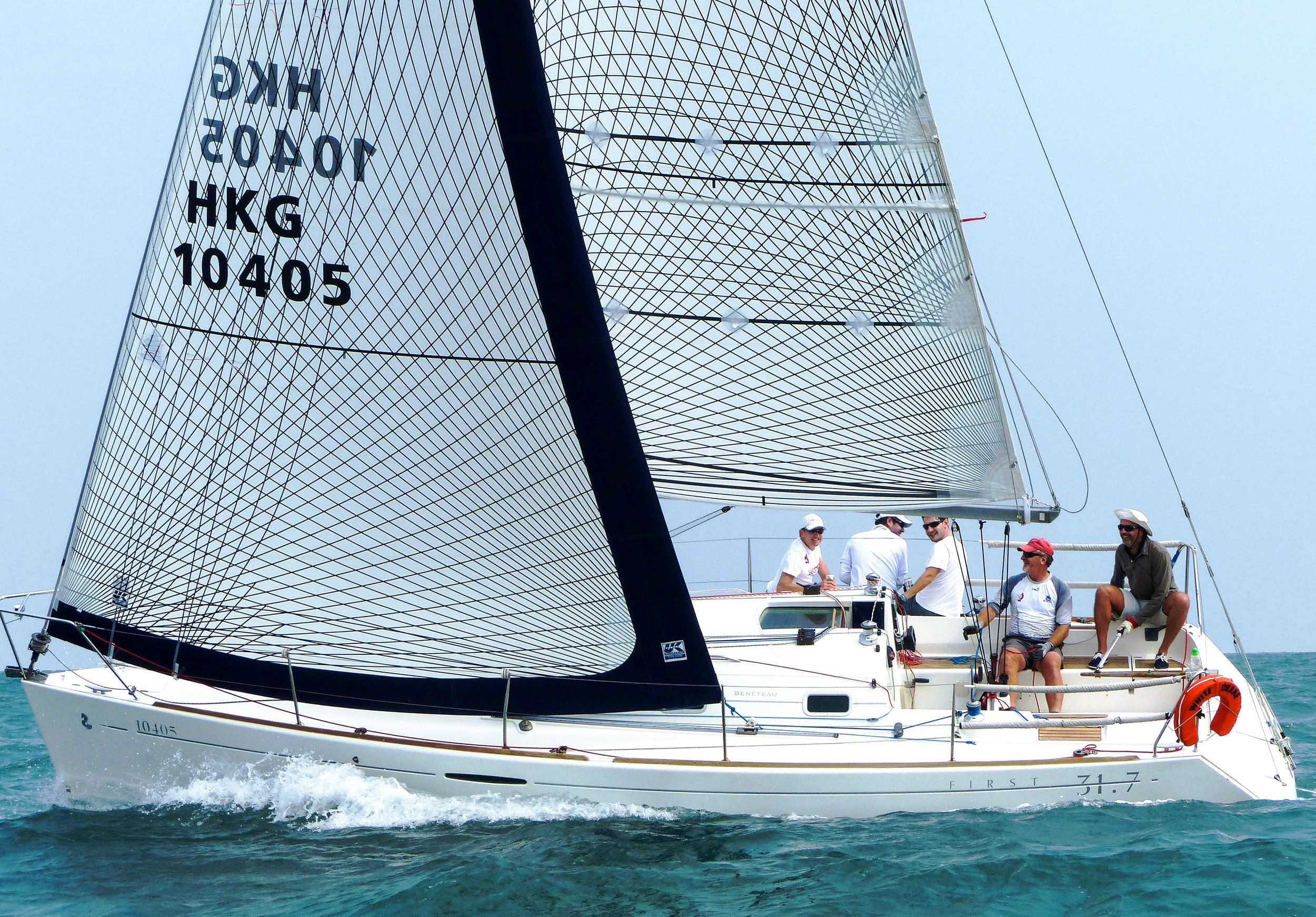 A Beneteau First 31.7 with Tape-Drive Carbon Polyester full-batten main and Passagemaker furling genoa.
