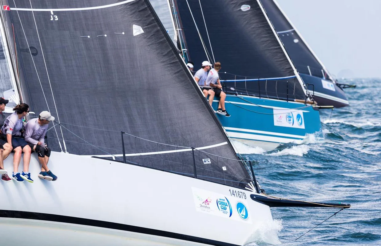 Above is a Mills 41 with a Titanium jib with Lite Skin outer layer. The mat-grey finish of the Lite Skin is clearly visible compared to the two boats to the right with black film sails.