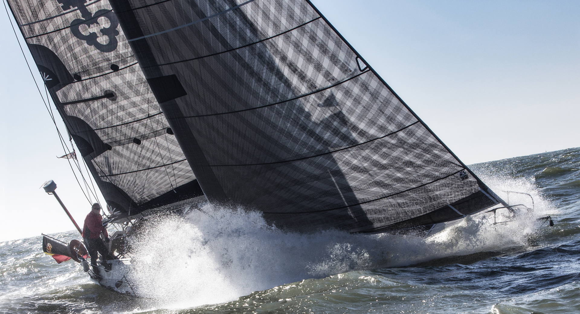 Depending on the boat size, performance level, weight and price, carbon X-Drive load-path fibers can be bonded to laminates reinforced with aramid scrims as shown above, or laminates reinforced with polyester scrims. Both laminates can gain chafe pr…