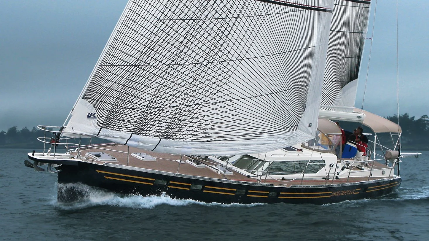 A Waterlines 50 with a Spectra/Carbon Passagemaker genoa that has three sets of reefs.