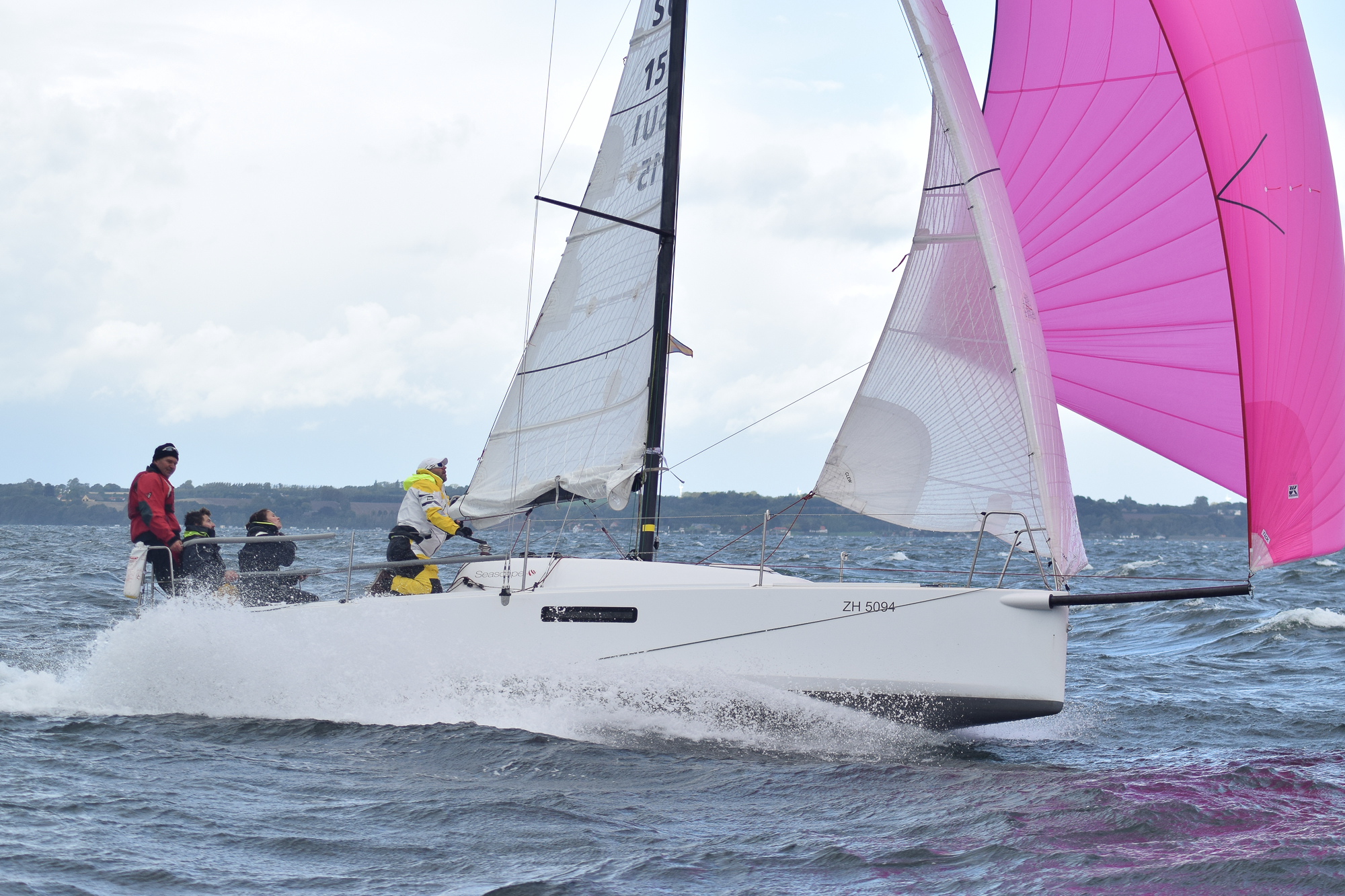 ESCAPADE with her reefed Tape-Drive Silver main, jib and fractional asymmetrical chute on the day she set the new speed record for a Seascape 27. All of her sails are original from 2013.