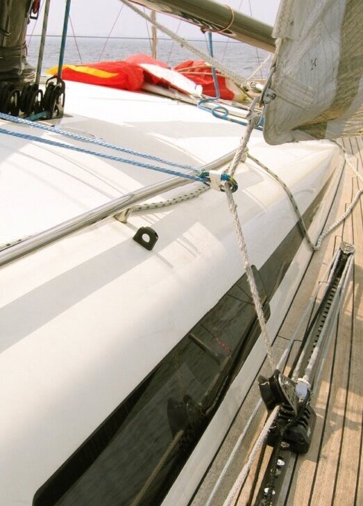 In-haulers deflect the jib sheet closer to the centerline of the boat allowing you to point higher. Make sure they are eased before the start since they will only slow you down while reaching back and forth on the starting line.