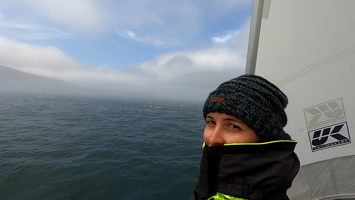 Amanda Seltzer keeping a lookout as the Amel 39 PANDA goes through a notorious Maine fog bank.