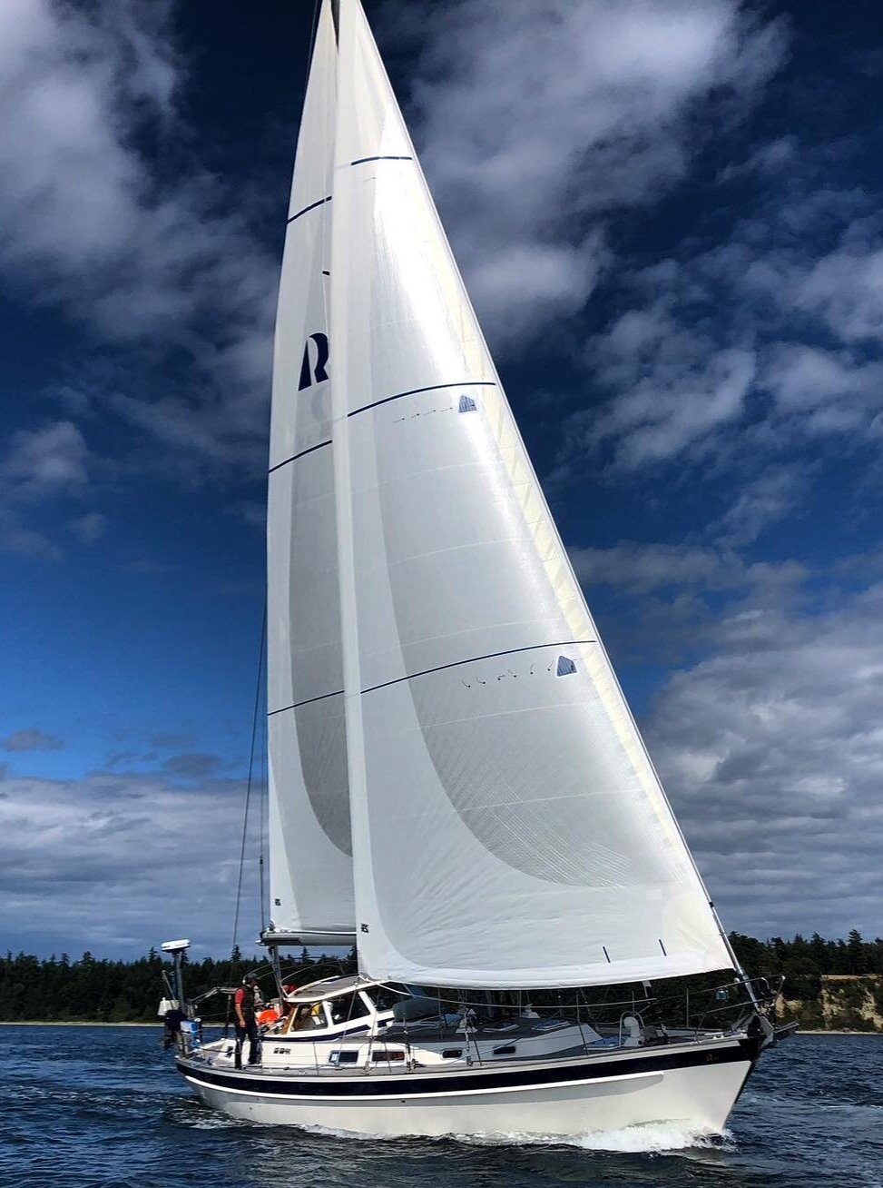 Hallberg Rassy 53 with X-Drive Endure sails where one full side of the sail covered with taffeta and the second side has a partial layer of taffeta on the foot and leech of both the main and genoa.