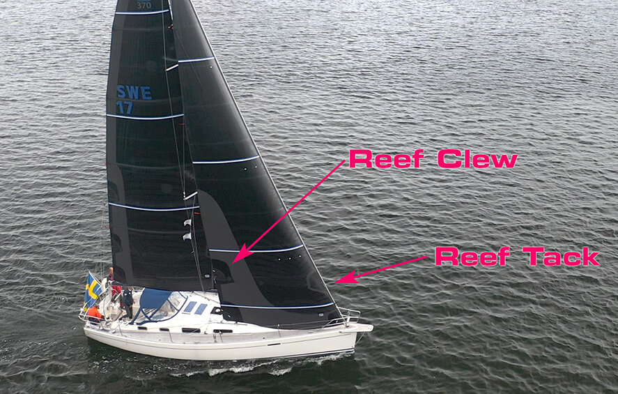 A SwedeStar 37 showing her X-Drive Carbon sails with double-sided black taffeta. Even though the jib has a luff tape that goes into the headstay foil, this jib can be slab reefed just as easily as those with hanks. Click on photos to enlarge.