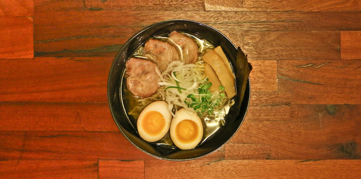 Dashi chintan, with mizuna microgreens and lime zest. Photo credit: me.