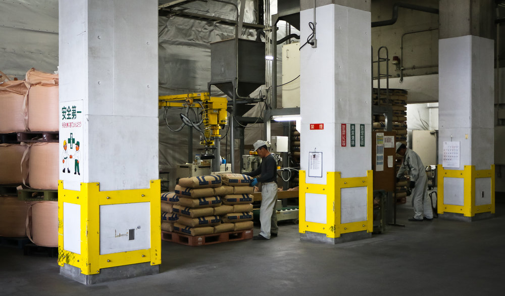 Rice millings being bagged for shipping