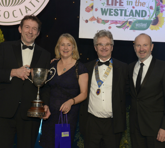 (L to R)&nbsp;Mike Burks, managing director of The Gardens Group, Louise Burks, director of The Gardens Group, Julian Winfield, GCA Chairman, and Fred MacAulay, comedian and awards dinner compere, at the GCA Annual Dinner and Awards Ceremony at The …