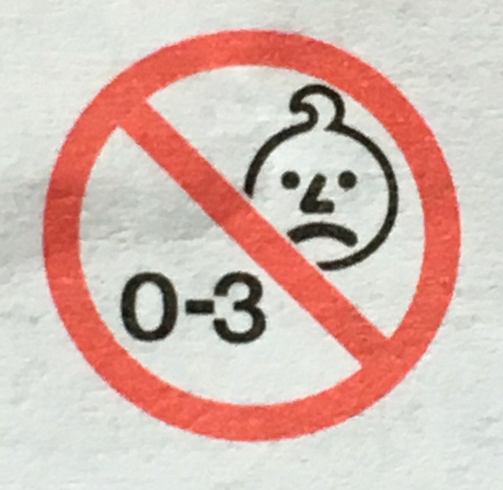  the warning in symbols: displeased baby in a stop sign 