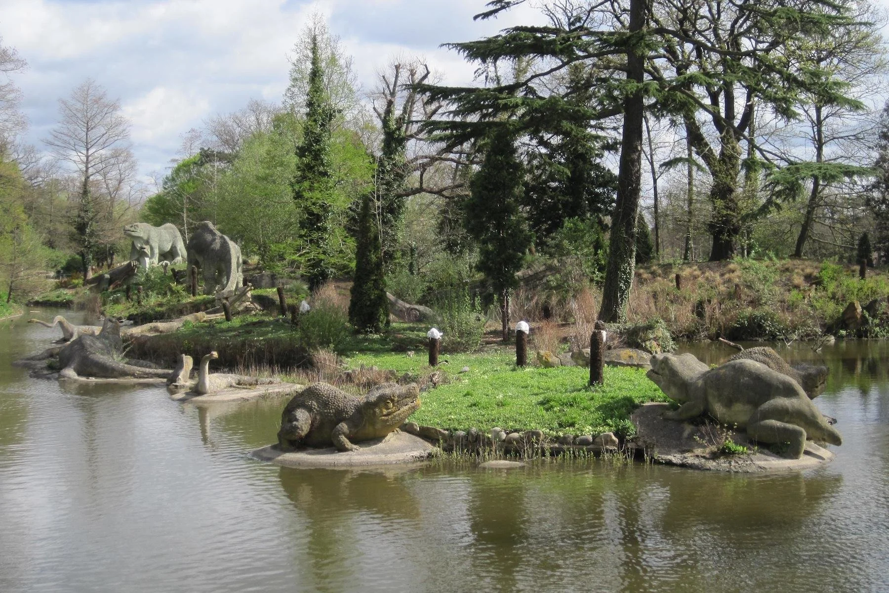  Some of the Crystal Palace dinosaurs - Victorian life-size sculptures (or replacements thereof) of dinosaurs, arranged on a tree-covered island in a small lake in Crystal Palace Park. 